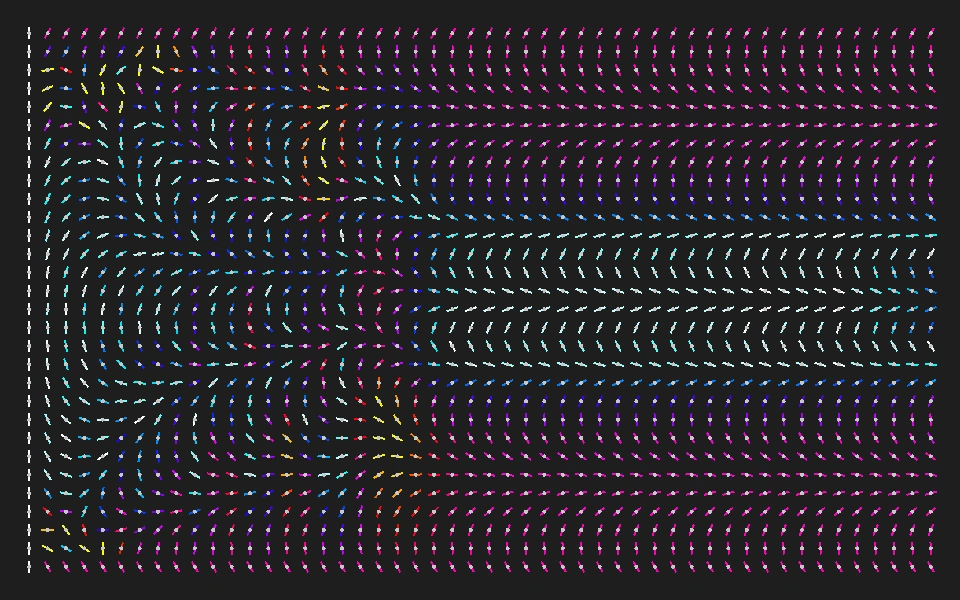A magnetic needle grid with colored moving needles responding to rotating borders and a frozen left edge.